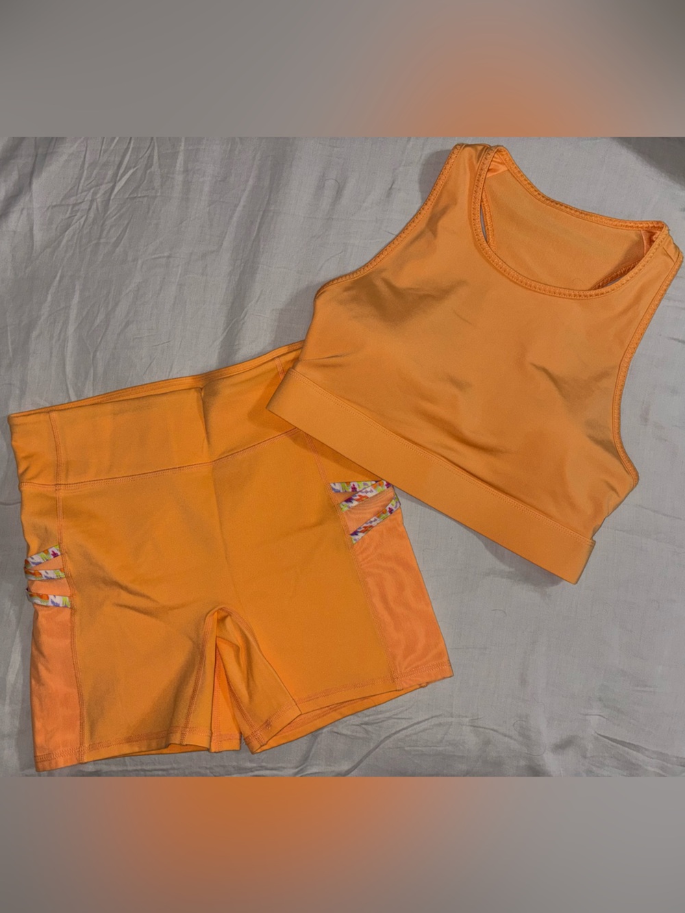 Fabletics Motion365 Biker Shorts & Sports Bra- Orange with Floral Accents